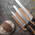 Mercer Culinary M23210 Millennia Black Handle, 10-Inch Wide Wavy Edge, Bread Knife